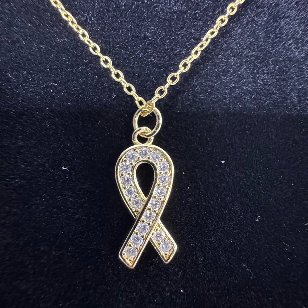 Elegant Gold Ribbon Pendant Necklace